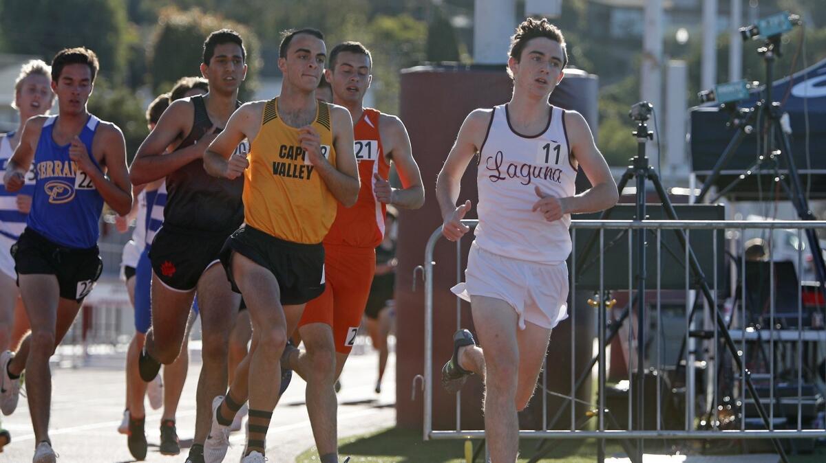 Laguna Beach High's Ryan Smithers (11), pictured running in the Laguna Beach Trophy Invitational on March 16, was part of the Breakers' winning mile relay at the Arcadia Invitational Friday.