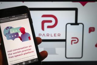 FILE - In this Jan. 10, 2021, file photo, the website of the social media platform Parler is displayed in Berlin. The digital media conglomerate Starboard said Friday, April 14, 2023, it purchased the conservative social media site Parler and will temporarily take down the app as it undergoes a “strategic assessment.” (Christophe Gateau/dpa via AP, File)