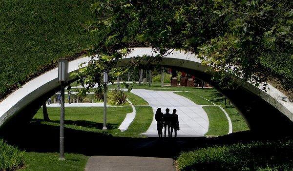 Students walk across campus at UC Irvine in 2008, the year before the law school opened.