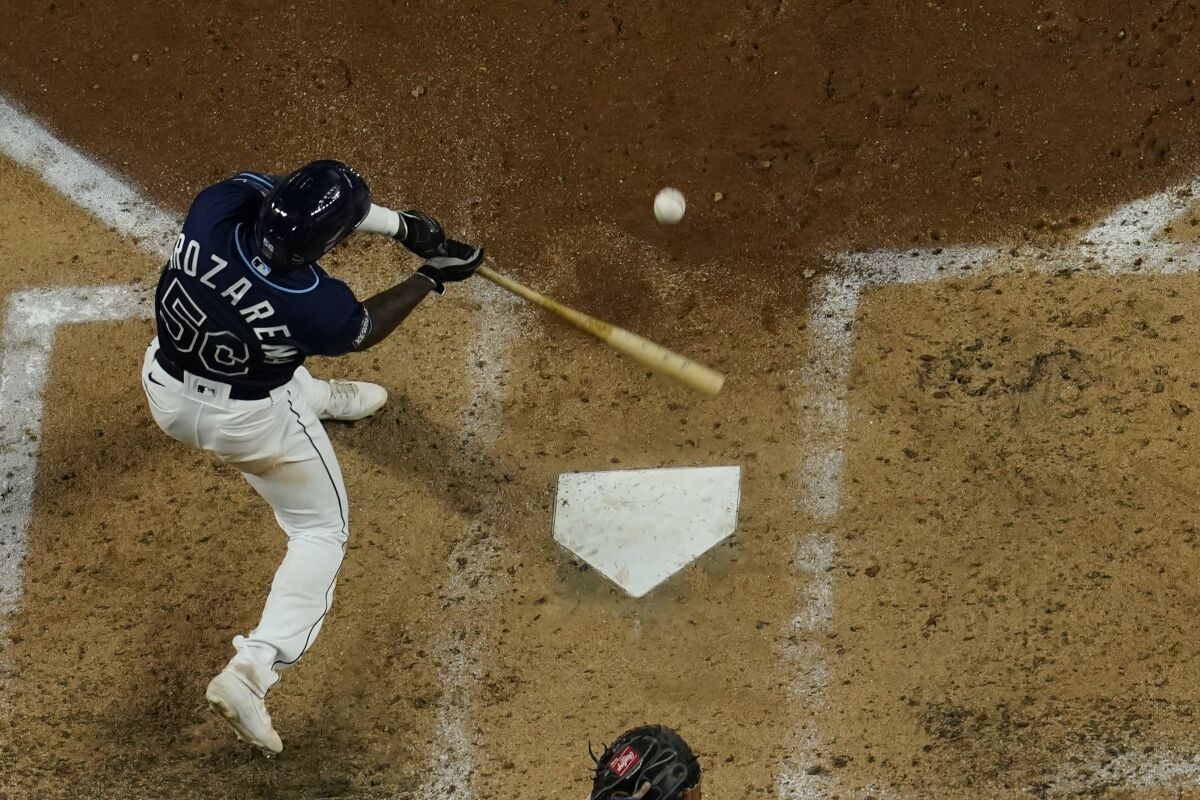 Tampa Bay's Randy Arozarena hits a home run against the Dodgers in the fourth inning.