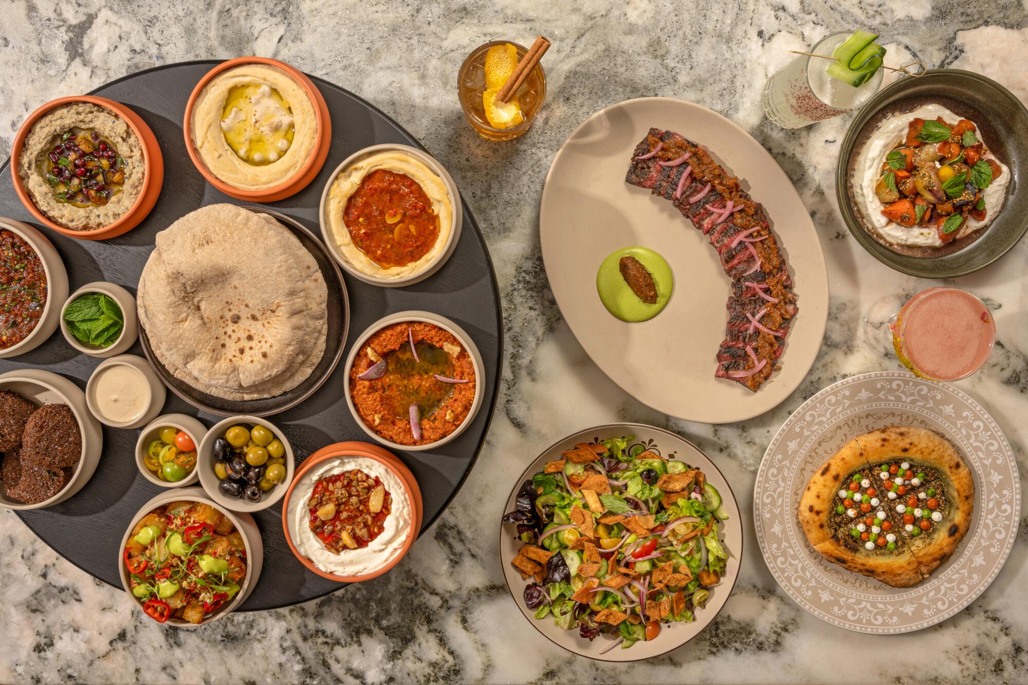 A full spread of dishes at Ladyhawk in Los Angeles. 