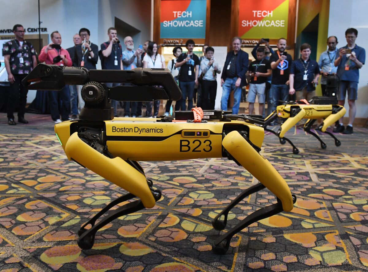 A robotic dog built by Boston Dynamics is demonstrated at a conference in Las Vegas in 2019.