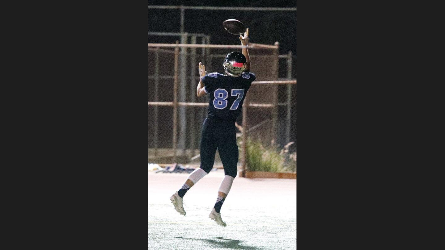 Photo Gallery: Crescenta Valley vs. Glendale in Pacific League football and the Crescenta Valley marching band takes the field in Halloween costumes