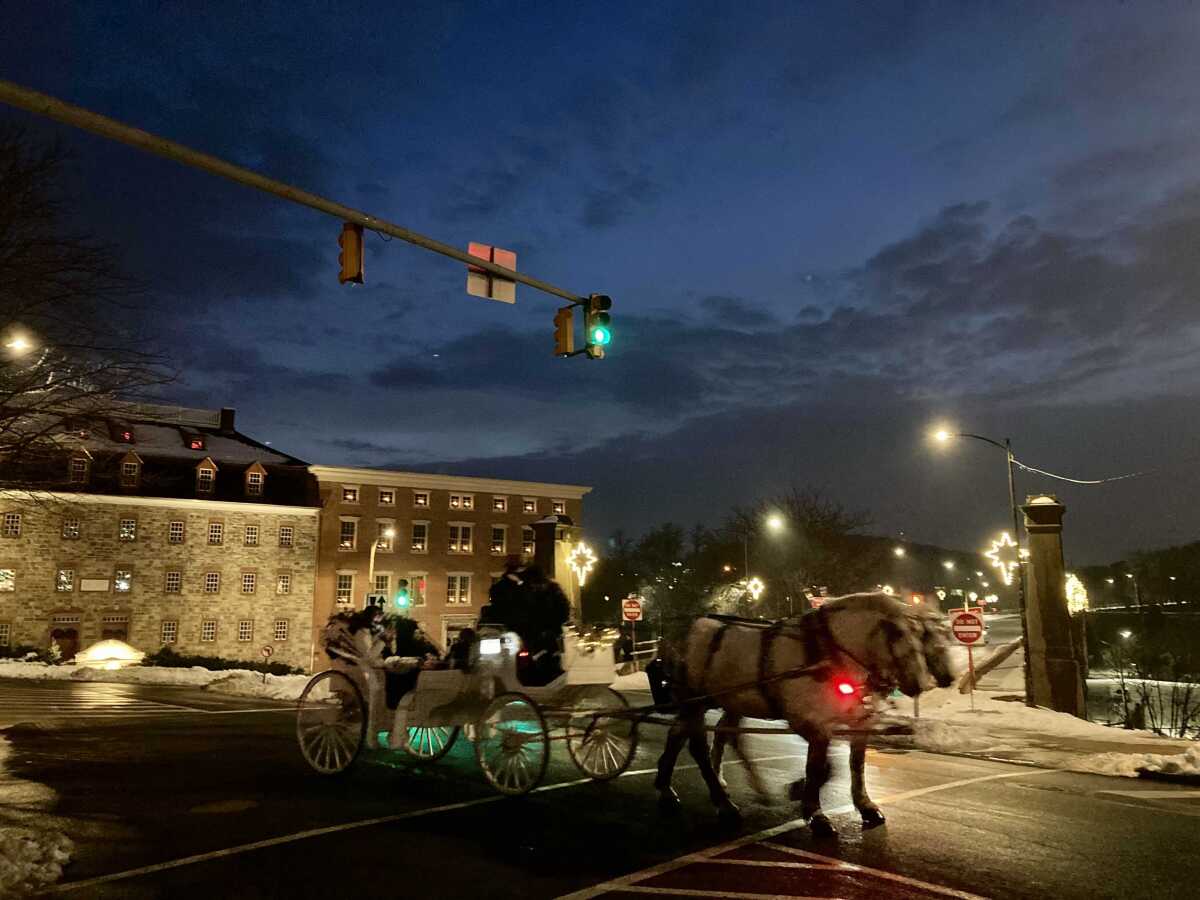 Visitors and locals alike can take horse-drawn carriage rides around Bethlehem, Pa.,  during the holiday season.