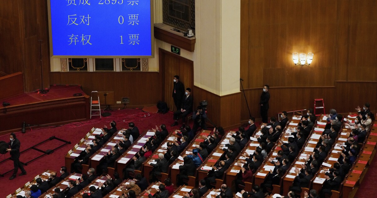 At annual political meetings, China lays out its plan to surpass the U.S. At annual political meetings, China lays out its plan to surpass the U.S.