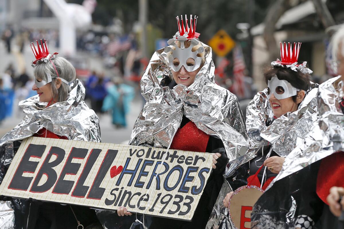 Members of the philanthropy group Ebell Club of Laguna Beach happily walk in the 56th annual Patriots Day Parade.