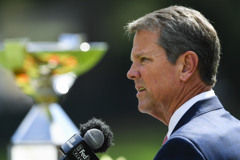 FILE-In this Thursday, Aug. 22, 2019 file photo, Georgia Governor Brian Kemp welcomes the Tour Championship golf tournament back to Atlanta before the first round, in Atlanta. Kemp plans to seek federal approval for a limited expansion of Medicaid that would require new enrollees to work, volunteer, receive job training or attend school. Kemp unveiled the plan on Monday, Nov. 4, 2019. (AP Photo/John Amis, File)