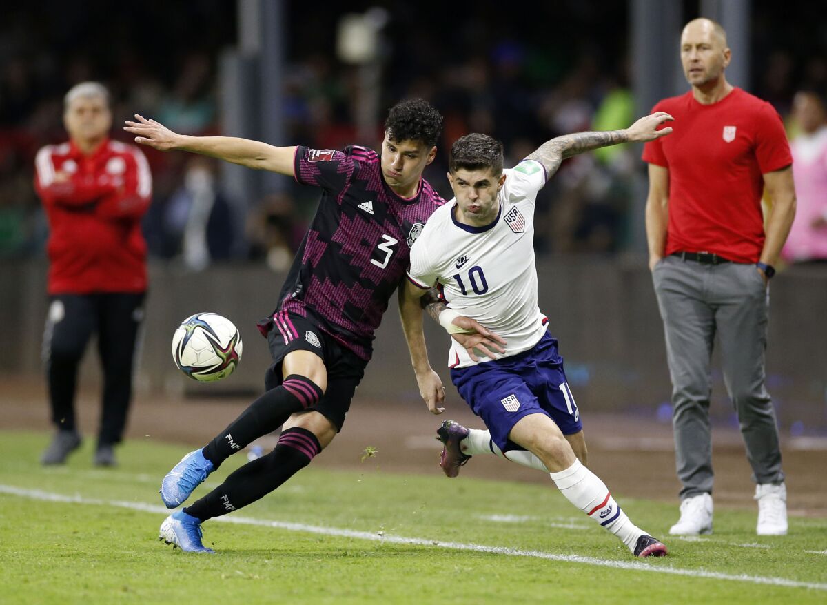 MEXICO CITY - MARCH 24: Mexico defender Jorge Sanchez (3) and United States forward Christian Pulisic.