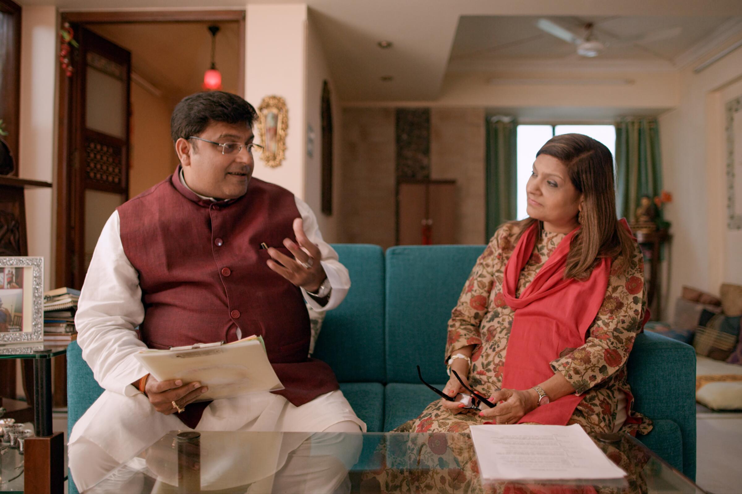 Matchmaker Sima Taparia, right, with astrologer Pundit Sushil-Ji in the Netflix series "Indian Matchmaking."
