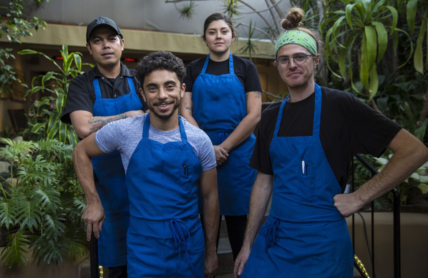 Chef Miles Thompson, front left, and sous chefs Jeff Lustre, far left, Vanessa Salguero and Rocco Romero at Michael's.