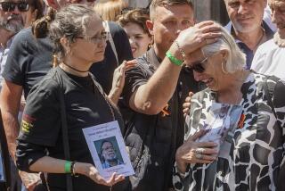 Cressida Haughton, left, who's father Derek and Deborah Dennis who's father Dennis died, react outside Central Hall in Westminster in London, after the publication of the Infected Blood Inquiry report, Monday May 20, 2024. British authorities and the country's public health service knowingly exposed tens of thousands of patients to deadly infections through contaminated blood and blood products, and hid the truth about the disaster for decades, an inquiry into the U.K.’s infected blood scandal found Monday. (Jeff Moore/PA via AP)