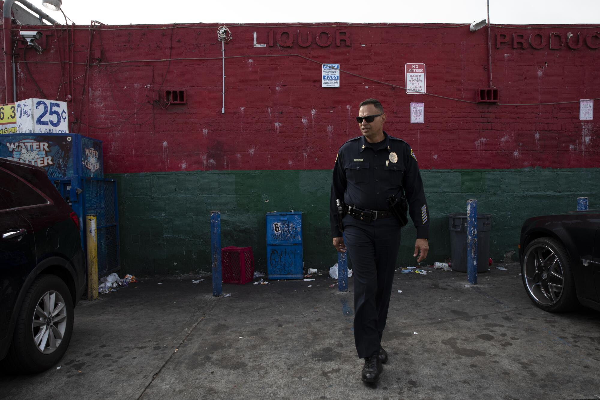 Capt. Manny Del Toro walks through an area where a shooting happened in September.