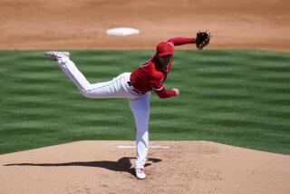 Los Angeles Angels pitcher Shohei Ohtani, of Japan, throws a pitch during the second inning of a spring training baseball game against the Kansas City Royals Monday, March 21, 2022, in Tempe, Ariz. (AP Photo/Ross D. Franklin)