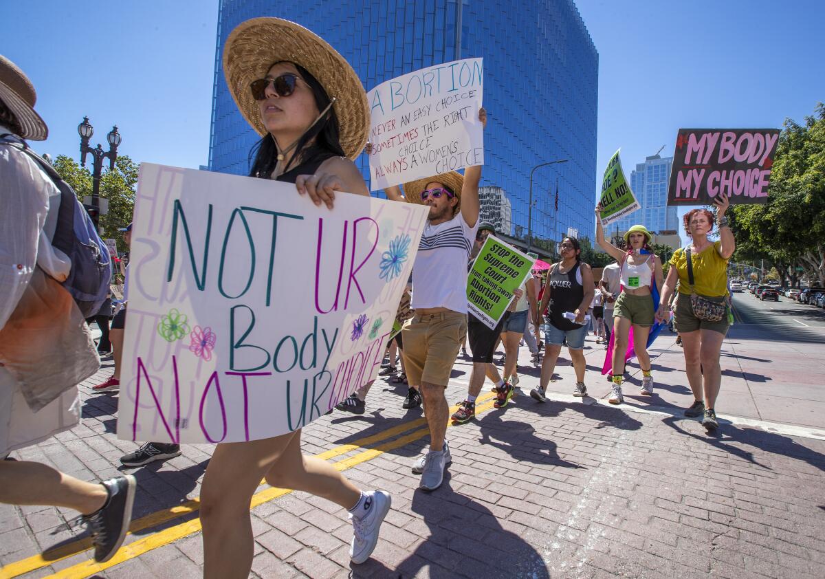 Abortion rights protesters march in Los Angeles. 