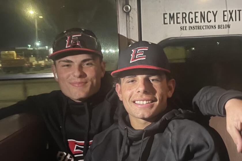 Etiwanda's Ebel brothers, Brady, left, and Trey combined to go eight for nine hitting against Foothill.