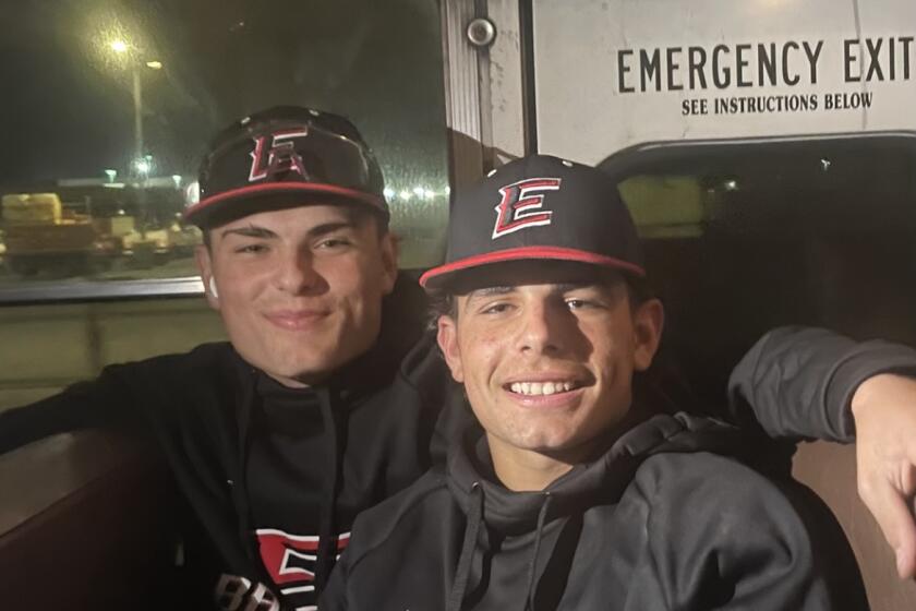 Etiwanda's Ebel brothers, Brady, left, and Trey combined to go eight for nine hitting against Foothill.