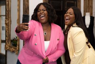 Raven Goodwin, left and Amber Riley in "Single Black Female" on Lifetime.