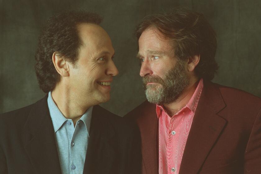 Billy Crystal, left, and Robin Williams together in 1997 to promote their movie "Father's Day."