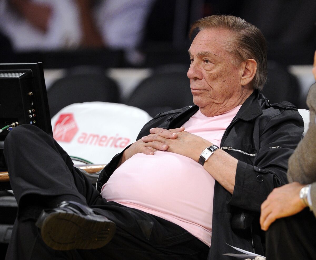 Then-Clippers owner Donald Sterling watches his team play the Utah Jazz in a 2010 game in Los Angeles.