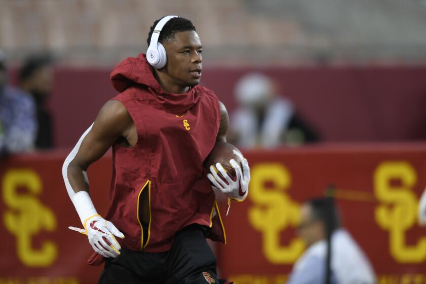 LOS ANGELES, CA - OCTOBER 13: Cornerback Olaijah Griffin #4 of the USC Trojans warms up before playing the Colorado Buffaloes at Los Angeles Memorial Coliseum on October 13, 2018 in Los Angeles, California. (Photo by John McCoy/Getty Images)