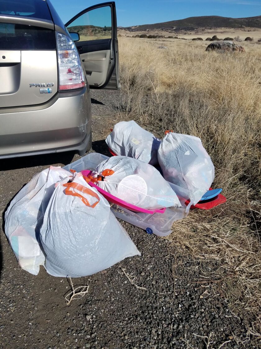 Julian, Calif., resident Virginia Duval filled several bags with trash left behind by visitors to the area.