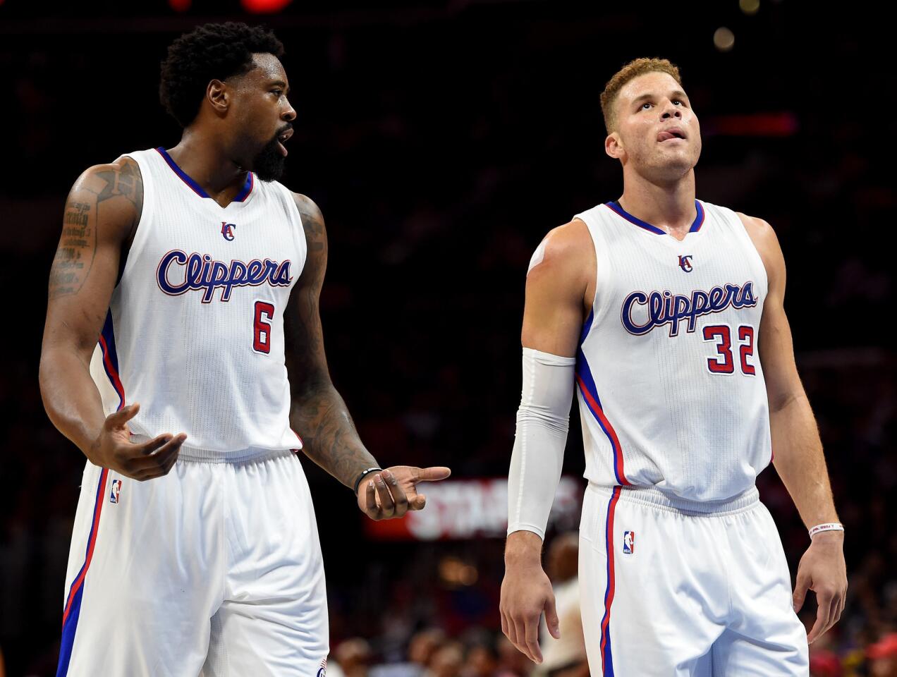 DeAndre Jordan and Blake Griffin talk during a break in the game Tuesday against the Lakers at Staples Center.
