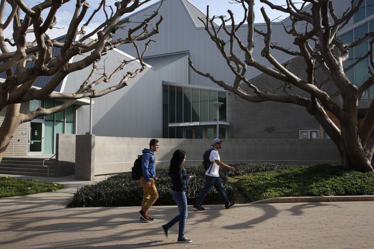 Students walk on the campus of Santa Monica City College. Aiming to dramatically expand access to higher education, President Obama has proposed tuition-free community college for millions of students.