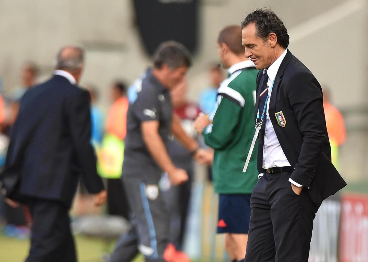 Italian coach Cesare Prandelli reacts after his team was eliminated from the World Cup by Uruguay with a 1-0 loss Tuesday at Estadio Arena das Dunas in Natal, Brazil.