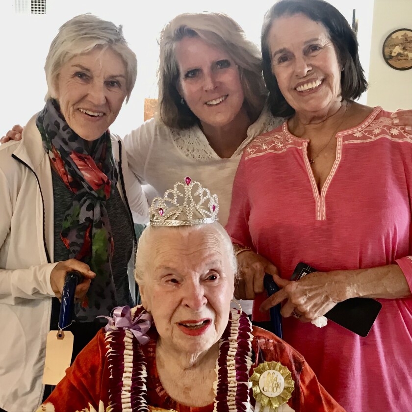 Phyllis Hobbs celebrates her 100th birthday with three of her nieces.