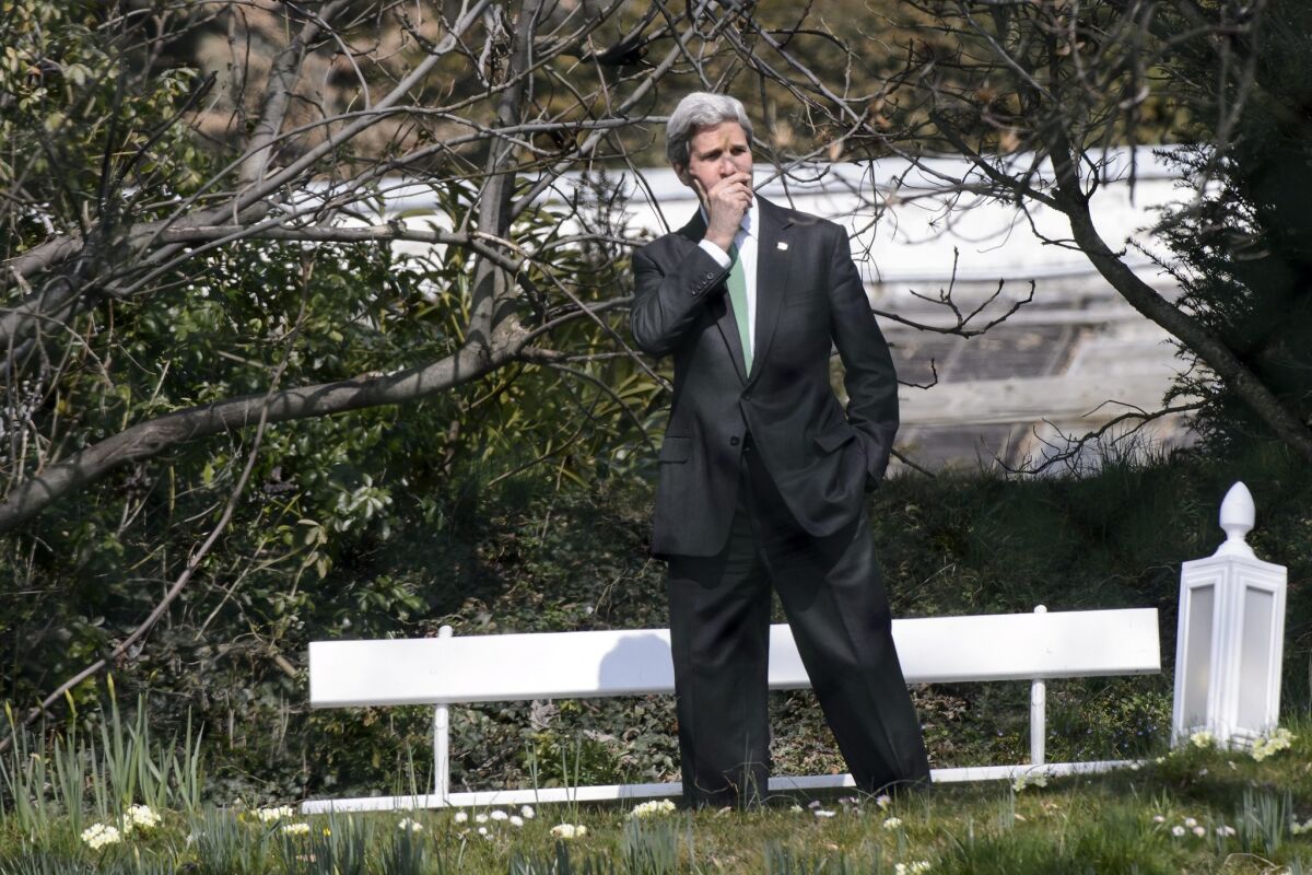 Secretary of State John F. Kerry takes a break after a meeting with Iranian Foreign Minister Mohammad Javad Zarif in Lausanne, Switzerland.