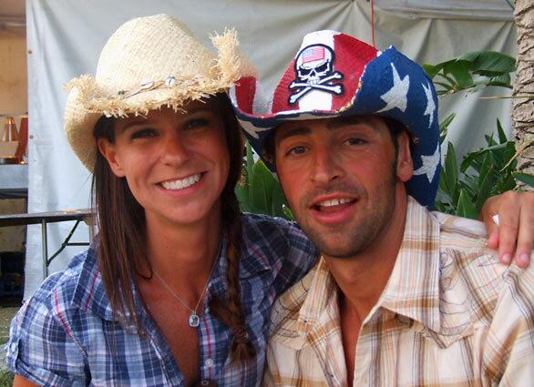 Gianpaolo Natale and Aimee Taylor from Irvine regret that they didn't wear matching hats.