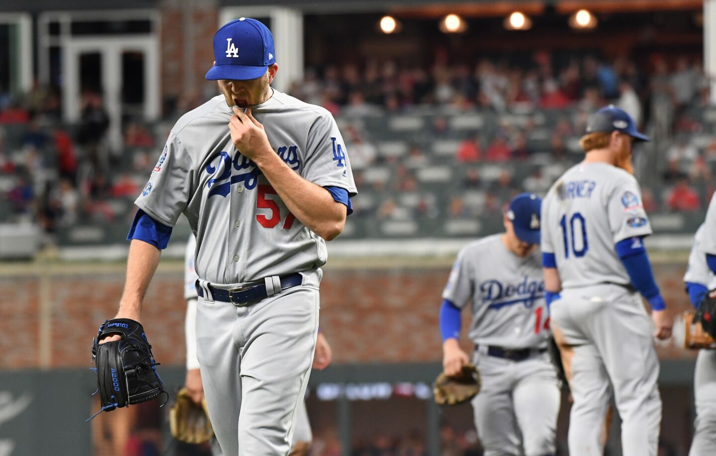 Dodgers reliever Alex Wood comes out of the game after giving up the go-ahead run to the Braves in the 6th inning.