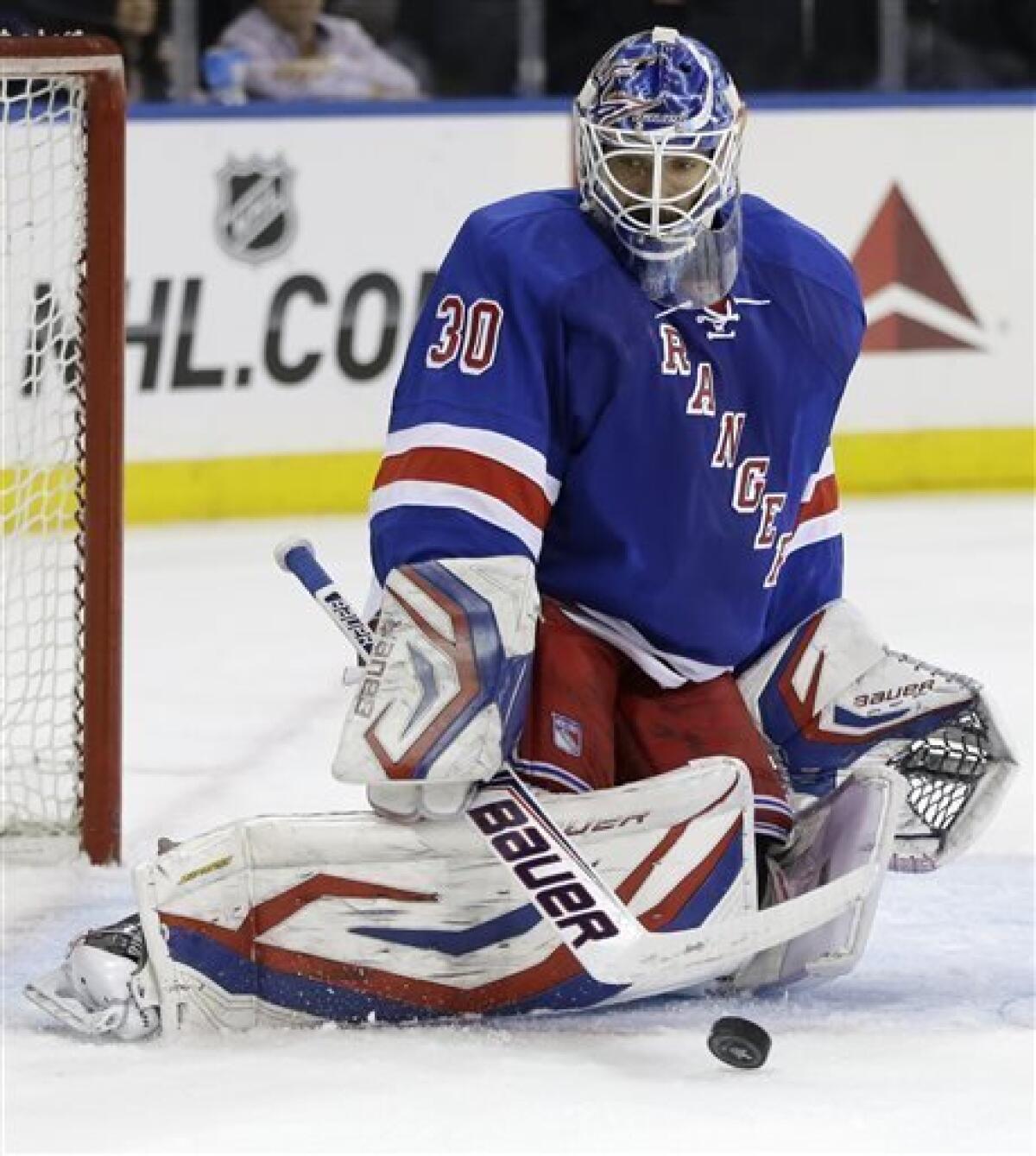 New York Rangers Henrik Lundqvist puts on a victory hat after the