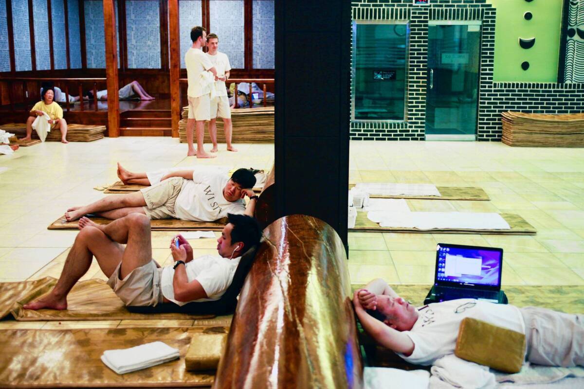 Wi Spa at the edge of Koreatown is a place where immigrants, children of immigrants, local hipsters and more spend the night together on mats after bathing, playing video games, eating and otherwise relaxing.