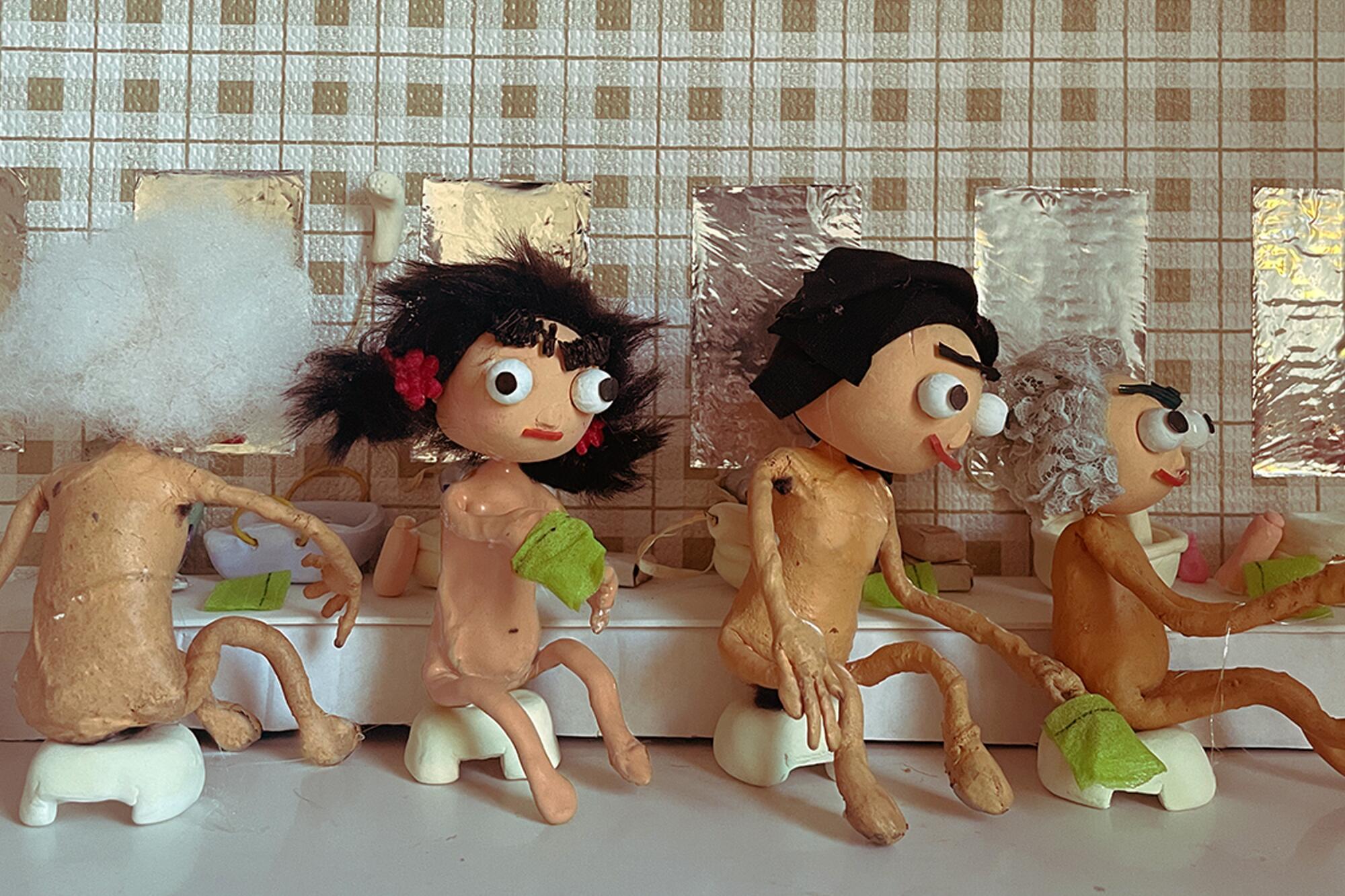 A photo of women puppets of all ages scrubbing their bodies in a spa.
