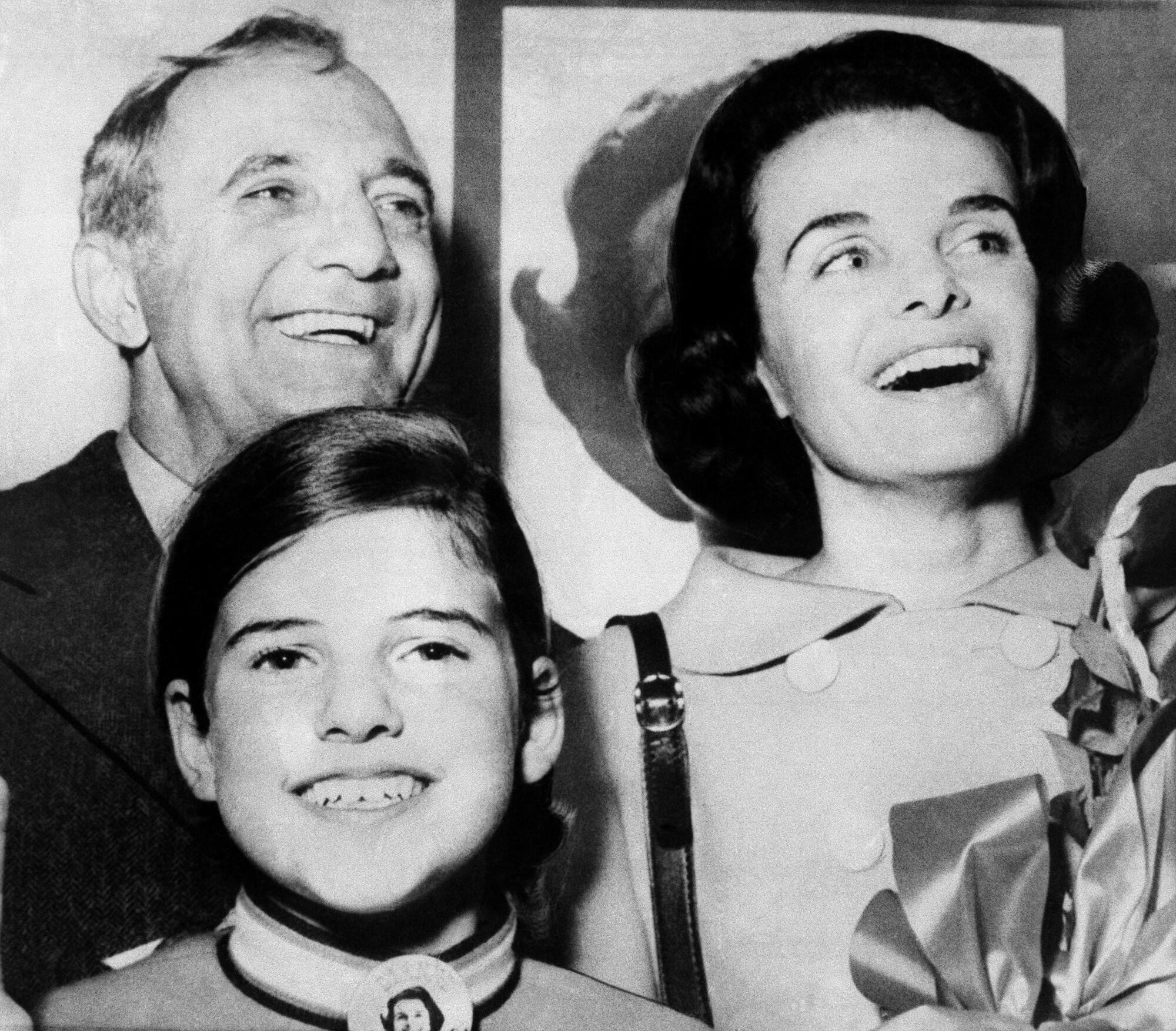 A black-and-white portrait of Dianne Feinstein with her second husband, Dr. Bertram Feinstein, and her daughter, Katherine.