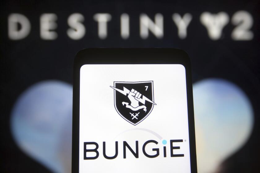 In this photo illustration, a Bungie Inc. logo of a video game developer is seen on a smartphone screen and Destiny 2 logo of an online video game in the background. (Photo by Pavlo Gonchar / SOPA Images/Sipa USA)(Sipa via AP Images)