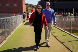 Angels owner Arte Moreno walks to the lower fields during Spring Training at Tempe Diablo Stadium