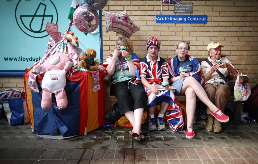 Well-wishers wait outside St Mary's Hospital for news of a royal birth.
