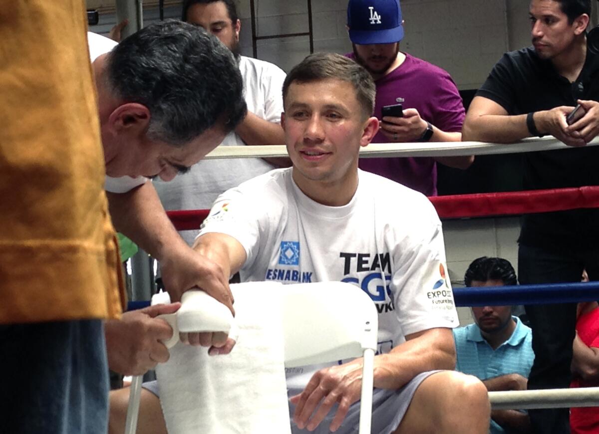 Gennady Golovkin has his hands wrapped by trainer Abel Sanchez prior to a workout at the Wild Card West Boxing Club on April 20.