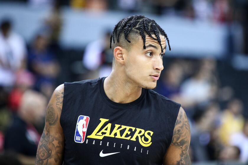 SHENZHEN, CHINA - OCTOBER 12: #0 Kyle Kuzma of the Los Angeles Lakers looks on before the match against the Brooklyn Nets during a preseason game as part of 2019 NBA Global Games China at Shenzhen Universiade Center on October 12, 2019 in Shenzhen, Guangdong, China. (Photo by Zhong Zhi/Getty Images)