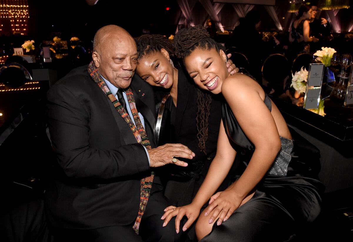 Quincy Jones, left, with Halle Bailey and Chloe Bailey of Chloe x Halle at the City of Hope Spirit of Life gala.