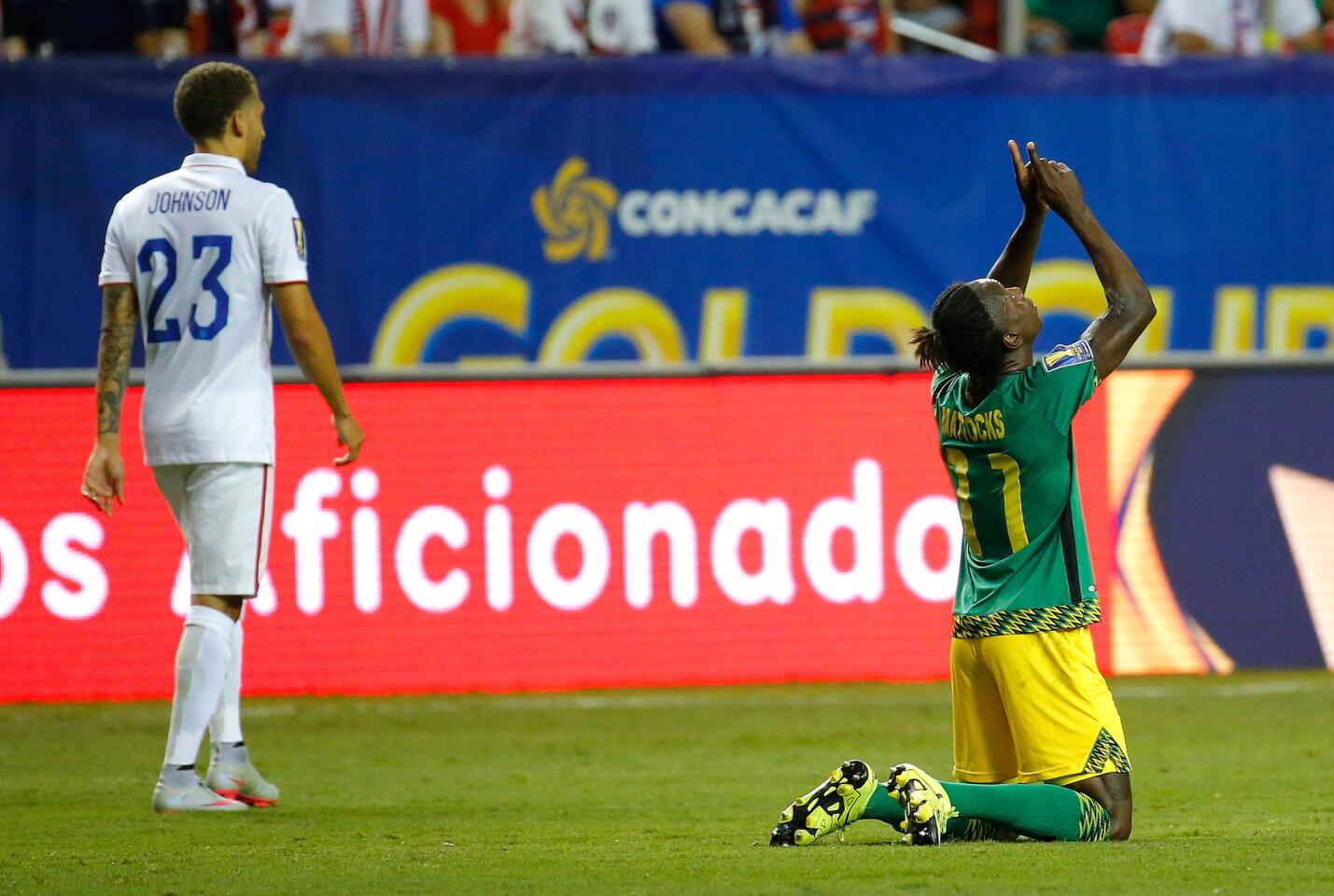 ATLANTA, GA - JULY 22: Darren Mattocks #11 of Jamaica celebrates scoring the opening goal against the United States of America during the 2015 CONCACAF Golf Cup Semifinal match between Jamaica and the United States at Georgia Dome on July 22, 2015 in Atlanta, Georgia. (Photo by Kevin C. Cox/Getty Images) ** OUTS - ELSENT, FPG - OUTS * NM, PH, VA if sourced by CT, LA or MoD **