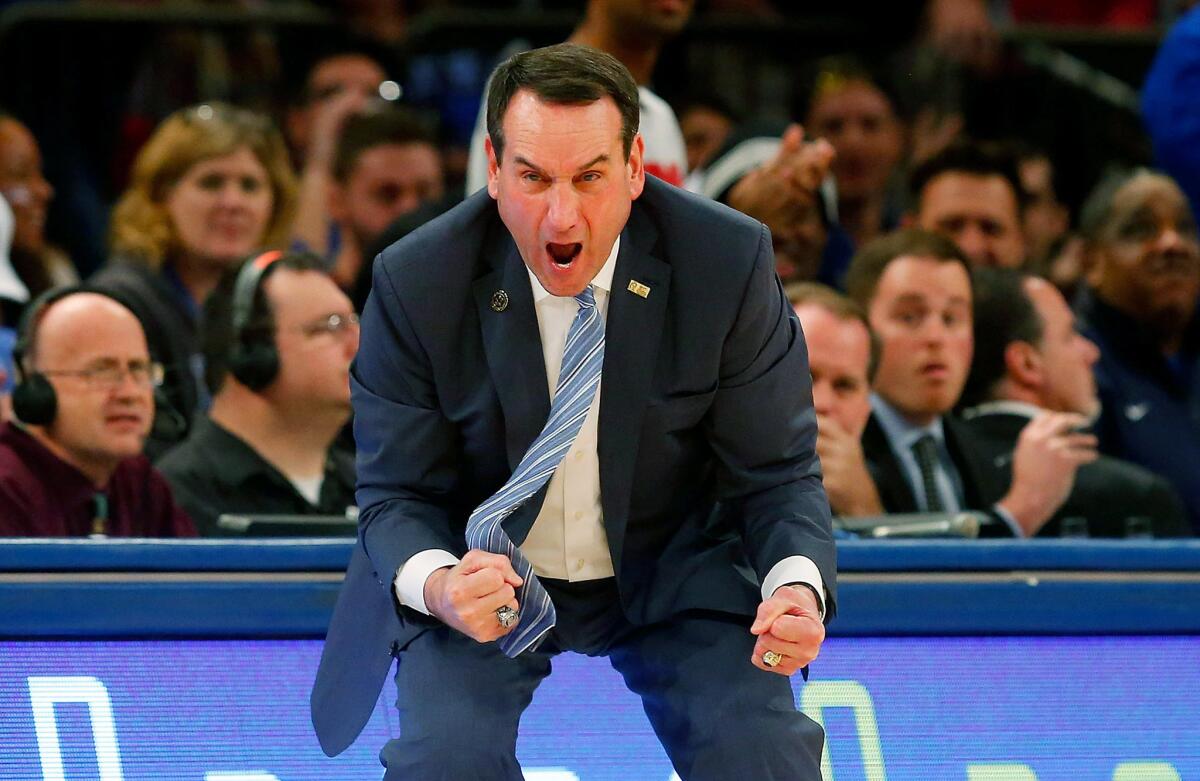 Duke Coach Mike Krzyzewski reacts during the second half of a game against Georgetown in the 2K Classic championship game at Madison Square Garden.