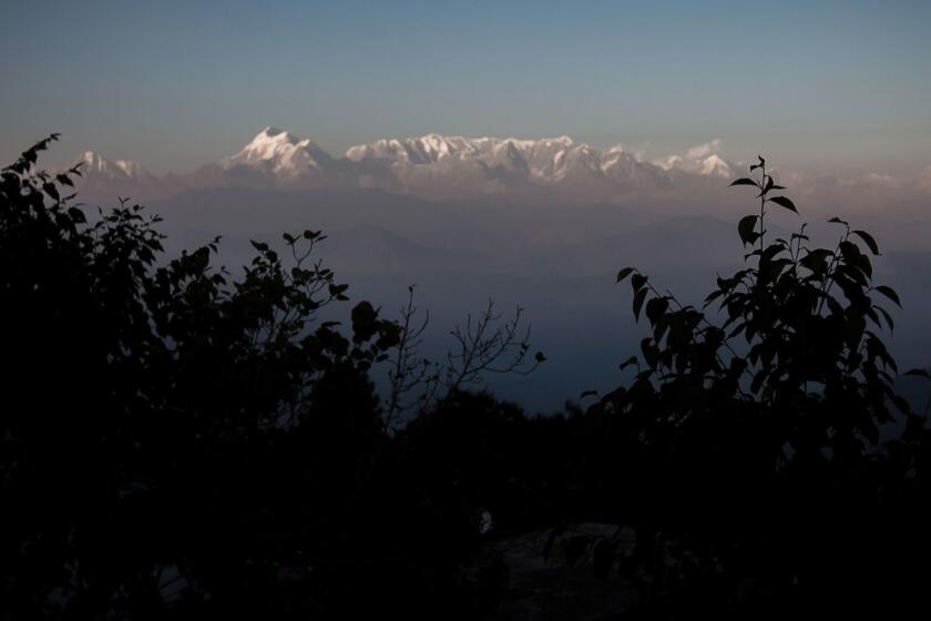 (FILES) This file photo taken on November 13, 2015, shows a general view of the Himalayas from the hill-station of Kausani in the northern Indian state of Uttarakhand. - Scores of emergency workers were battling bad weather Saturday to locate eight climbers missing on India's second highest mountain, an official said. Four Britons, two Americans, an Australian and an Indian were set to climb the 7,826-metre (25,643-foot) Nanda Devi East peak -- near the border with China -- and return to the base camp last weekend. (Photo by Agnes BUN / AFP)AGNES BUN/AFP/Getty Images ** OUTS - ELSENT, FPG, CM - OUTS * NM, PH, VA if sourced by CT, LA or MoD **