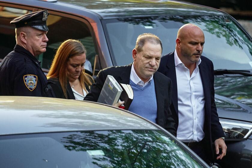 Harvey Weinstein arrives at the first precinct while turning himself to authorities following allegations of sexual misconduct, Friday, May 25, 2018, in New York. (AP Photo/Andres Kudacki)