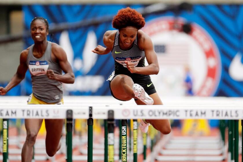 Brianna Rollins competes during the first round of the women's 100-meter hurdles on July 7.