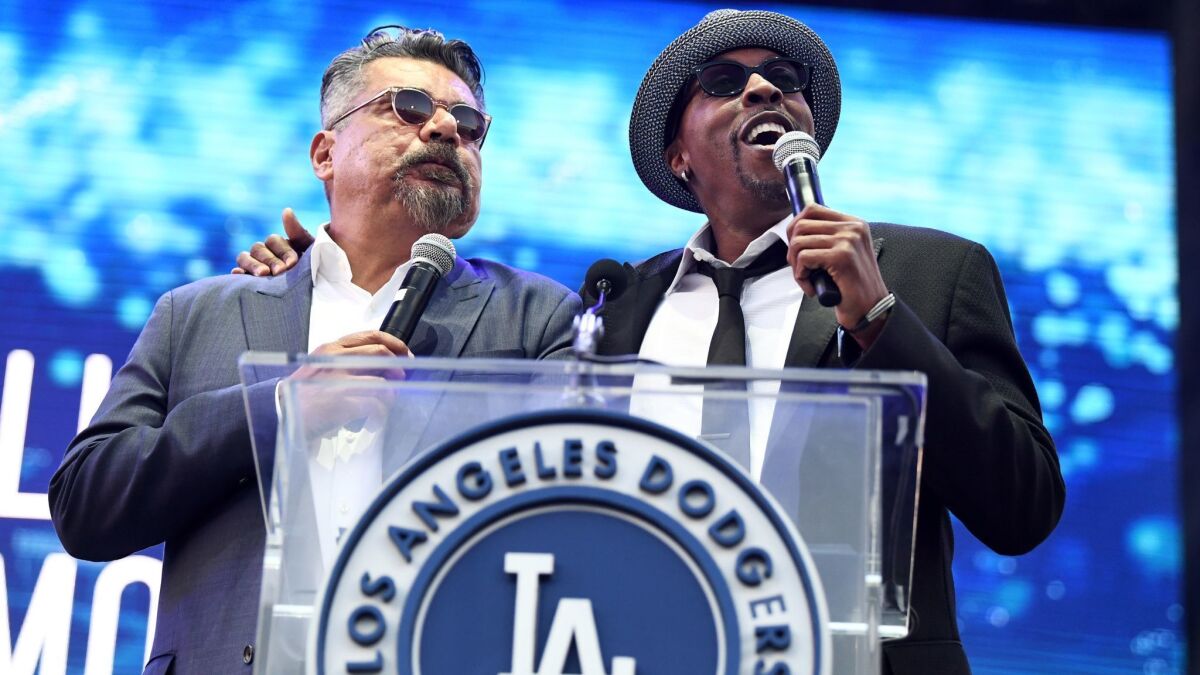 George Lopez, left, and Arsenio Hall co-hosted the event.