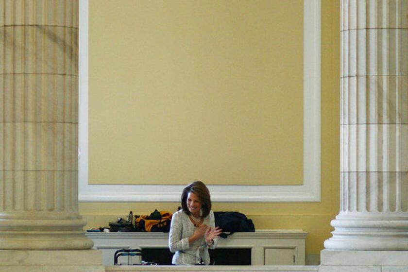 Republican Rep. Michele Bachmann of Minnesota in Washington on Friday preparing for a television interview.