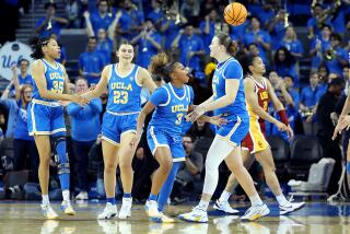 LOS ANGELES-CA-DECEMBER 30, 2023: UCLA Women's basketball team celebrates their win over USC.